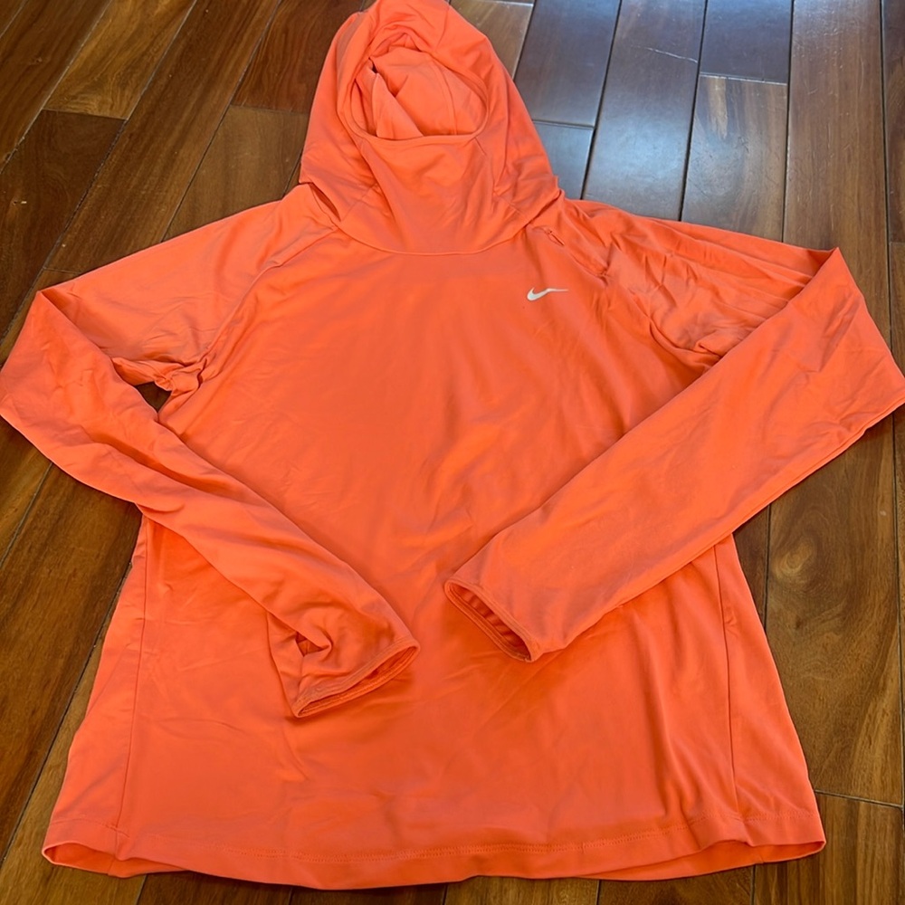 Nike dry fit hoodie and a tangerine cordial color size medium